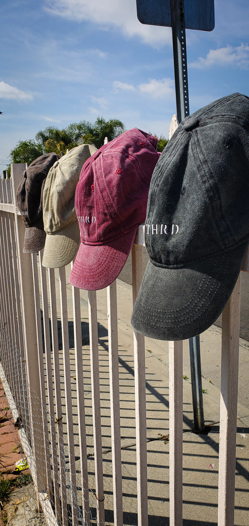 UNBOTHERED LOGO EMBROIDERED DISTRESSED BASEBALL CAPS. UNISEX HATS. COLORS: VINTAGE BLACK, RUBY RED, KHAKI, COFFEE