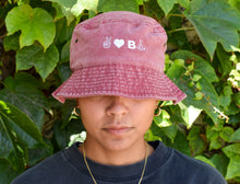 Load image into Gallery viewer, UNISEX BUCKET HAT, PEACE, LOVE, BE UNBTHRD. FADED RED HAT.
