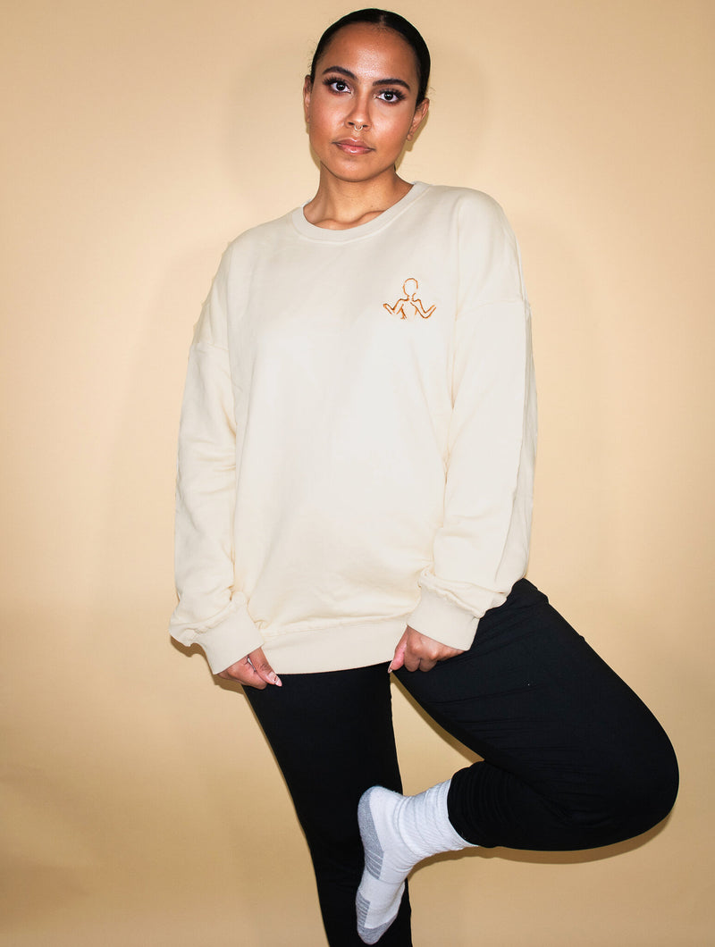 EMBROIDERED DOLL LOGO UNISEX OVERSIZED SWEATSHIRTS. CREAM COLOR